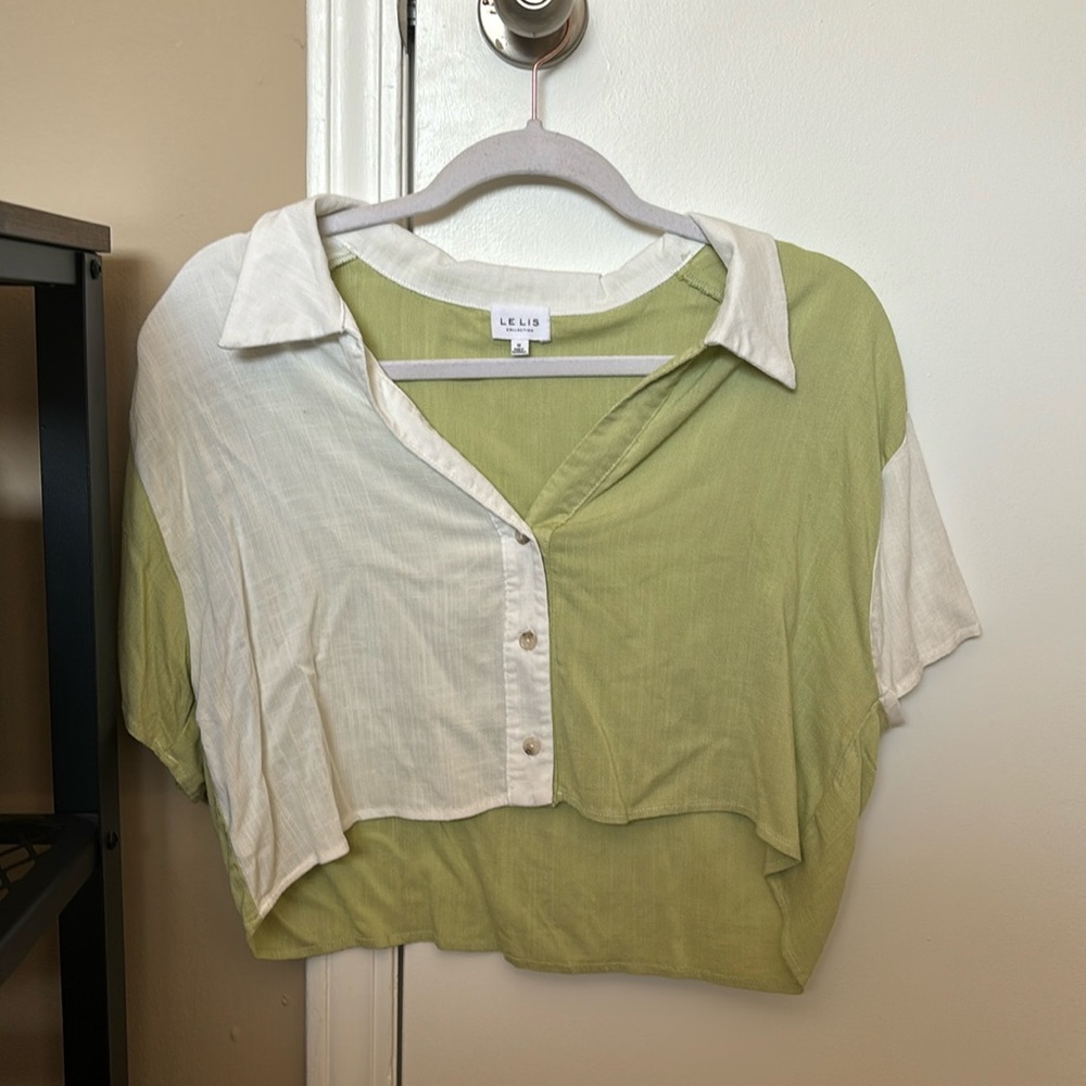 This is a white and green button down size medium.